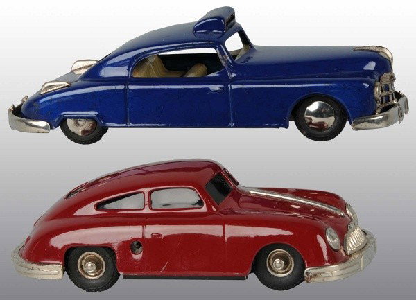 Lot of 2: Tin Automobile Wind-Up Toys.: German. Working. Both marked "Made in Western Germany". Includes one Gescha Porsche Sixmobil with disc on bottom for steering and one Arnold Taxi with some spidering to litho and oxidation to front gr