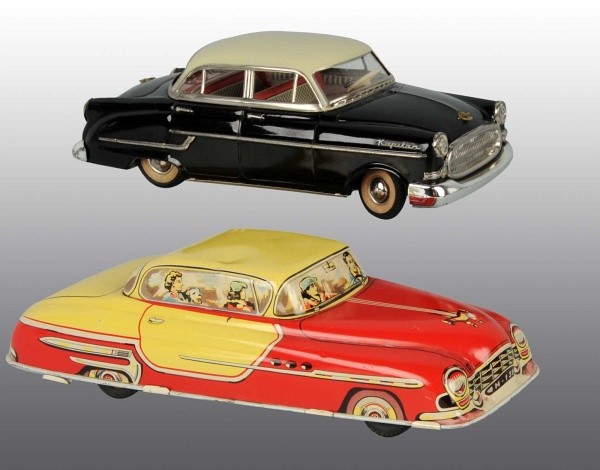 Lot of 2: Tin Automobile Friction Toys.: German. Working. Both marked "Made in Western Germany". Includes one Gama Opel Kapitan with lithographed luggage in rear window and one small dent in hood. Also includes one Huki Saloon Car with litho