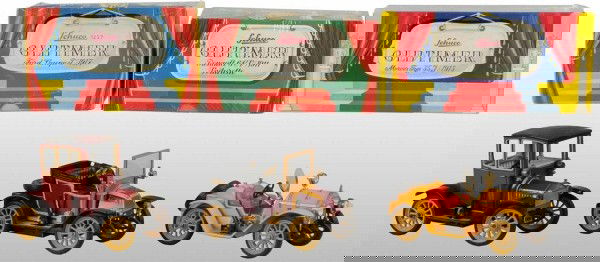 Lot of 3: Tin Schuco Old-Timer Car Wind-Up Toys.: German. Working. Two are vintage and one is contemporary. Includes all original boxes. Each: 11 - 1/4" L. (Excellent).