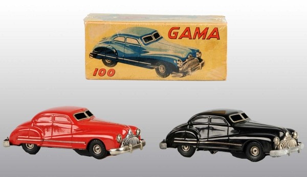 Lot of 2: Tin Automobile Wind-Up Toys.: German. Working. Red and black version of the same Gama 100 Car. Very little wear overall. Includes one original box. Each: 6 - 1/2" L. (Excellent).