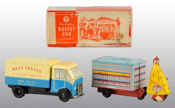 Lot of 2: Tin Food Delivery Vehicle Wind-Up Toys.: Working. Includes one English Chad Valley Buffet car with original box. Buffet car has opening side door to reveal a lithographed kitchen scene. Also includes one German. Dairy Cart pulled by walking 