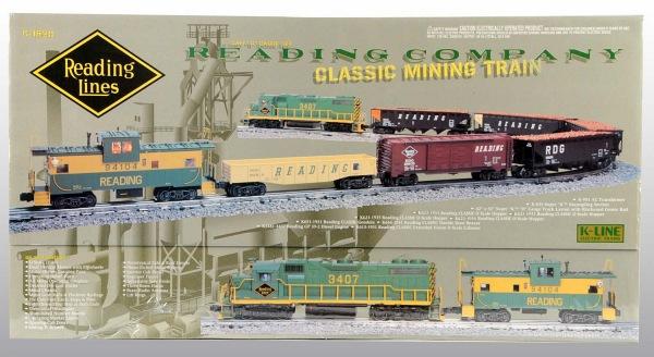 K-Line Reading Lines Electric Train Set.: Contemporary. Set comes with diesel-type engine and freight cars marked "Reading". Sealed in original box and includes shipping box. Box: 40" x 21". (Mint).