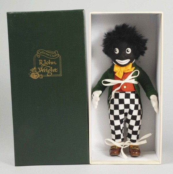 R. John Wright "Golliwogg".: #552 of a limited edition of 2500, 1997. All felt with jointed shoulders and hips, all original in box with certificate. 10" T. (Excellent).