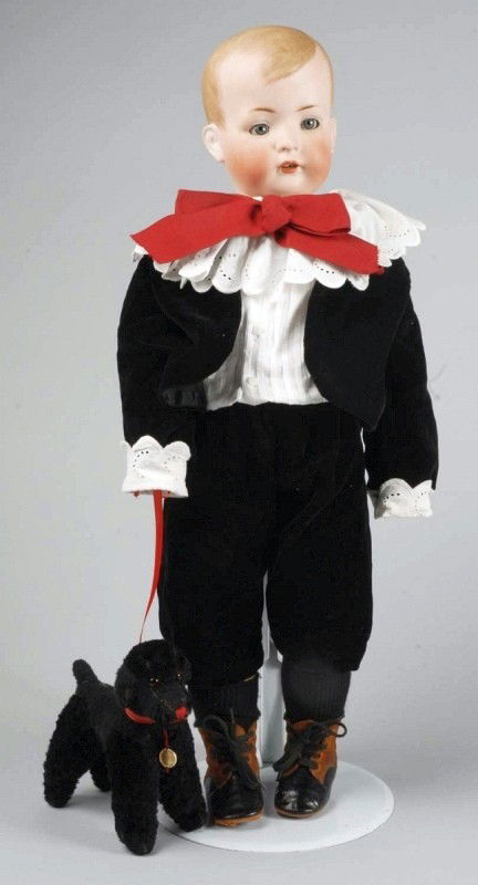 German Bisque Character Doll "Tommy Tucker".: Bisque socket head marked BSW in heart 2048 made by Bruno Schmidt. Molded light brown hair, wavy multi-stroked eyebrows, blue sleeping eyes, painted upper and lower eyelashes, open mouth with 2 upper