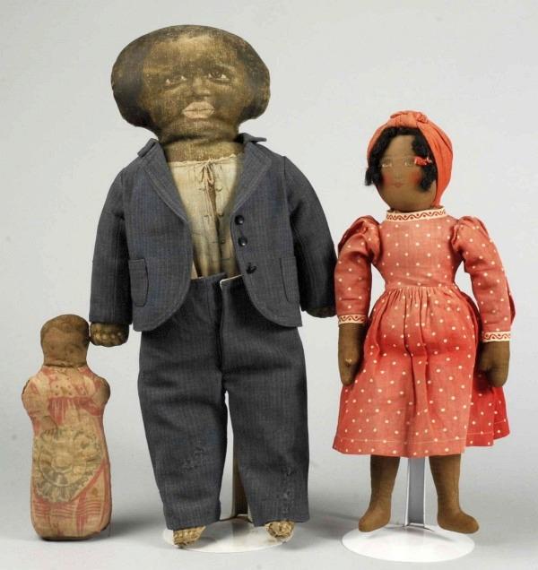 Lot of 3 Black Cloth Dolls.: Babyland Rag" with beautifully painted early-style face, black mohair wig, original red cotton dress (some fading) and panties with ribbon from the famous Lenon Hoyte Museum Collection of primarily bl