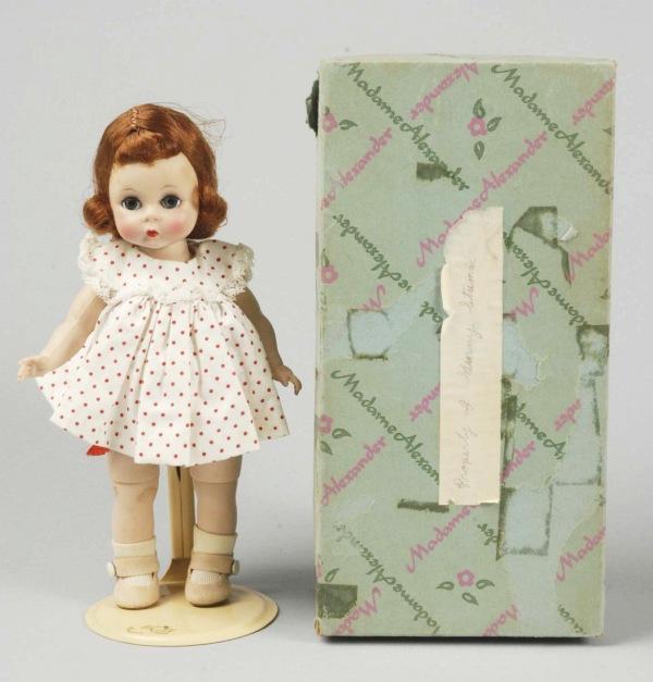 Hard Plastic Sweet Madame Alexander "Wendy".: Blue sleeping eyes with molded eyelashes, rare red hair, rosy cheeks, bent-knee walker, original white panties with red polka dots, shoes and socks. In an Alexander box with "500 Blonde" label and wea