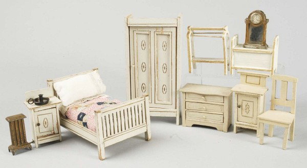 Antique Gottschalck Doll House Bedroom Suite.: Includes 11 pieces. White painted armoire, bed with patchwork quilt, two nightstands, towel rack (repainted), painted chair; Schneegass chest of drawers, German soft metal clock, cast metal radiator, 