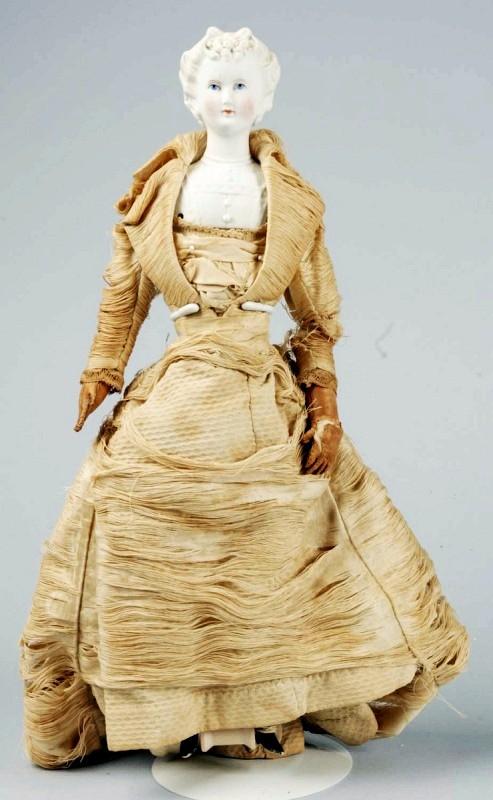 Lovely German Parian Bisque Lady Doll.: Rare model with untinted white hair in "Countess Dagmar" style with cluster of curls on forehead, combed up into a fancy sweep in the back, blue painted eyes, black eyelash line, red eyelid line, clos