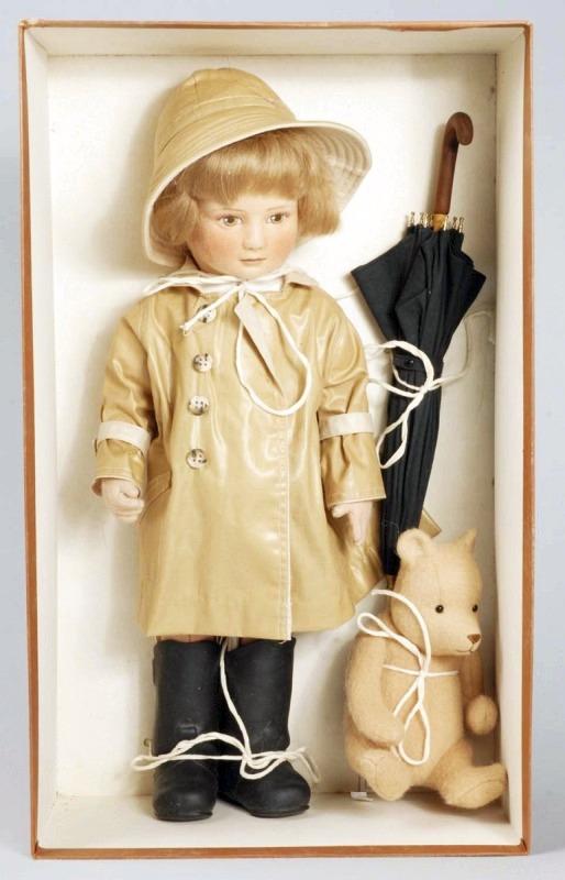 R. John Wright "Winnie-the-Pooh" Characters.: Christopher Robin" Series II, 1986-1987, all felt with molded and painted features, original rain outfit and umbrella and Wellingtons, with a jointed plush "Winnie-the-Pooh," in original box #264/500.