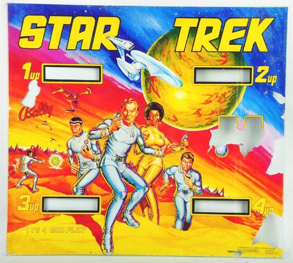 Glass from Star Trek Pinball Machine Game.: Nice reverse painting of Stark Trek characters. Moderate paint loss, particularly to scorekeeping areas. Size: 28 - 1/2" x 25 - 1/2".