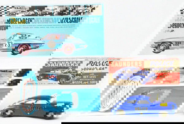 Lot of 2: Plastic Vehicle Toys.: American. Includes unused and sealed Revel Corvette model and friction Saunders police car. Includes both original boxes. Size: Largest: 8 - 1/4" L.