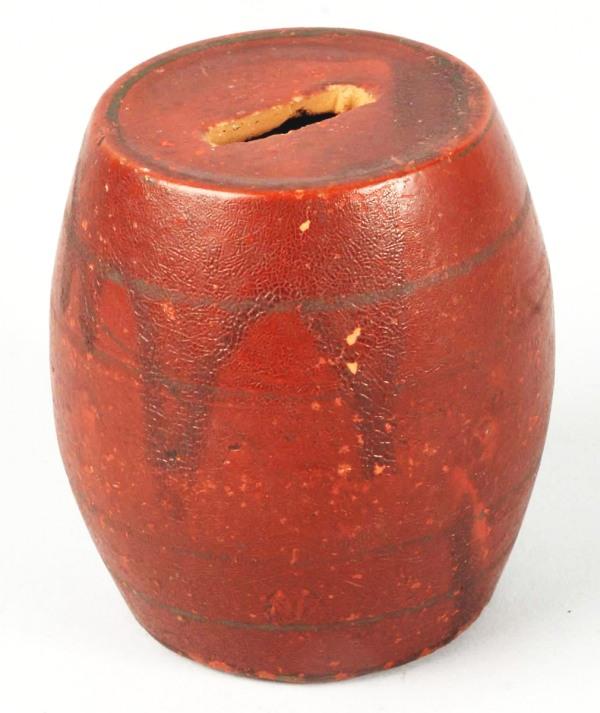 Early Redware Pottery Barrel-Shaped Still Bank.: Circa 1880. A few minor chips to coin slot area. Size: 3 - 1/2" T.