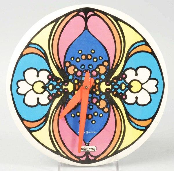 Peter Max General Electric Clock.: Celluloid over cardboard face. Working. Size: 9" Dia.