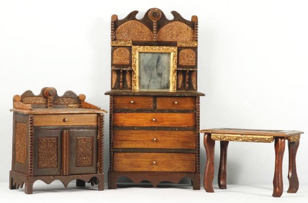 Lot of 3: Tramp Art Children's Furniture Pieces.: Circa 1890 to 1910. Includes dresser, table, and two door stand with drawer. Size: Largest: 21" T.