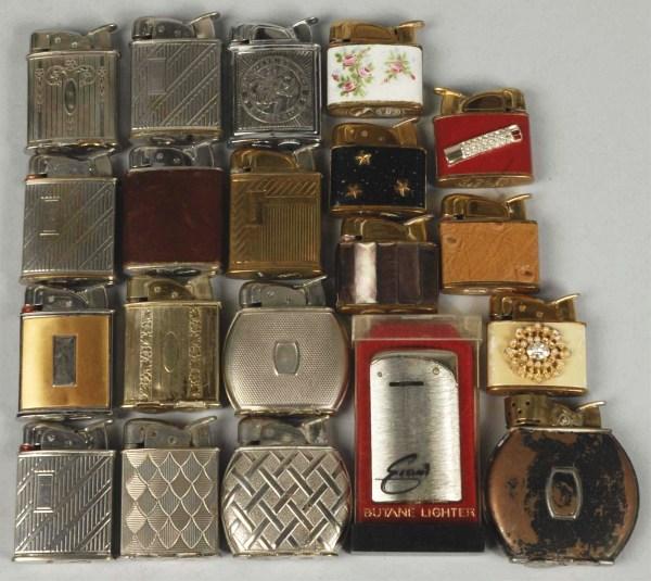Lot of Approximately 21 Evans Lighters.: Size: Largest: 2 - 1/2" T.