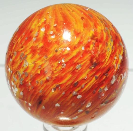 Large Onionskin Marble with Mica.: Yellow base with orange and loaded with big chunks of mica. As-made circle cold roll indentation and several chips throughout. Size: 1 - 15/16" Dia.