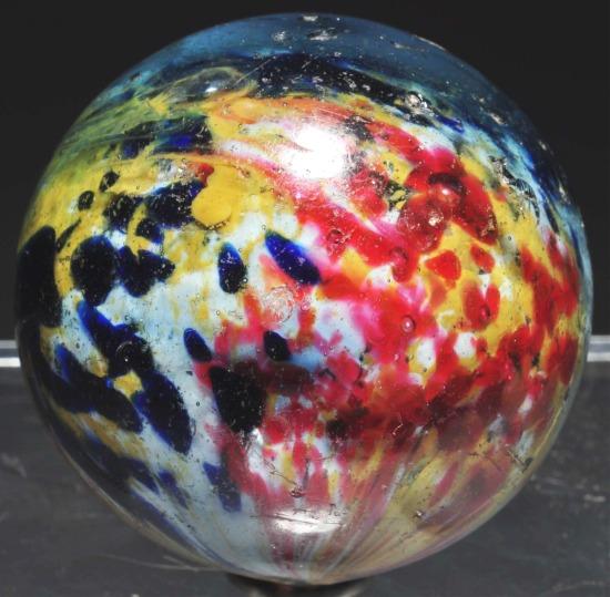 Single Pontil End of Day Marble.: Two panels of red, yellow and white and two panels of cobalt and white. Size: 1 - 5/8" Dia.