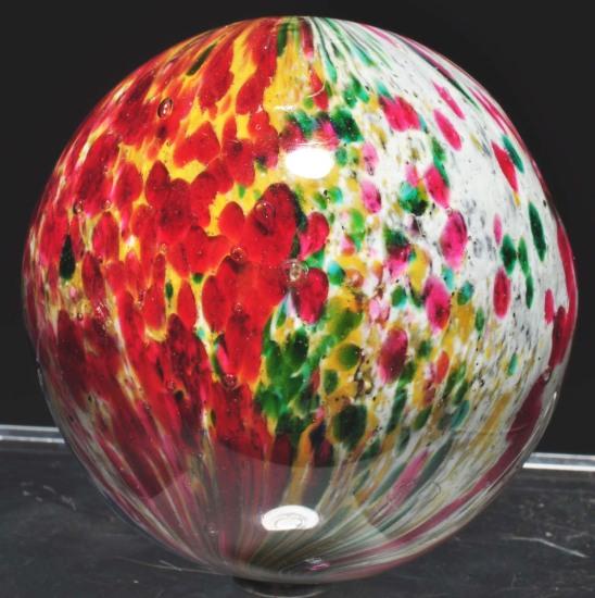 Onionskin with Mica Marble.: Four-paneled onionskin with mica. Two panels are red/yellow and one panel is white and cobalt. Nice spotting of colors. Marble is polished and pontils are not opened in color. Size: 2 - 3/8" Dia.