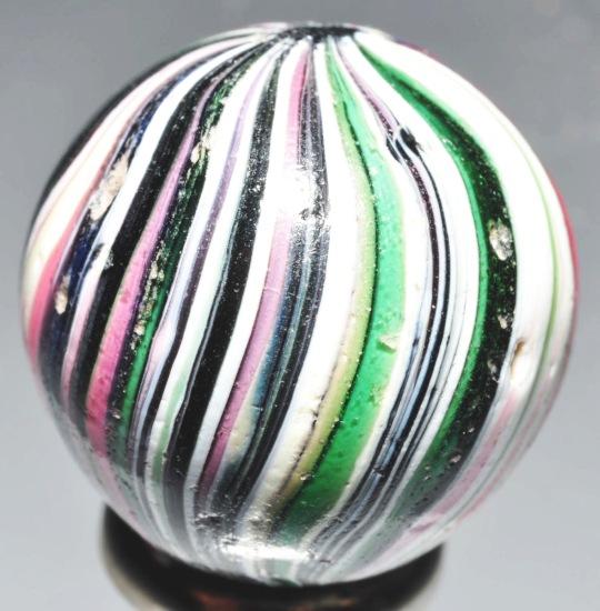 360 Indian Swirl Marble.: Has one as made flat spot. Size: 11/16" Dia.