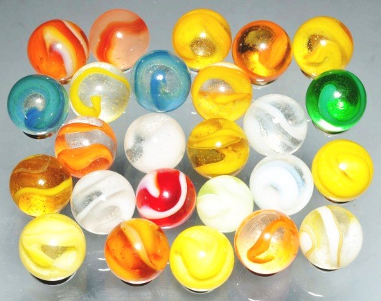 Lot of 25: Akro Snake Marbles.: Average group of Akro snakes. Some are two color on clear and several are colored glass. Size: 5/8" Dia.