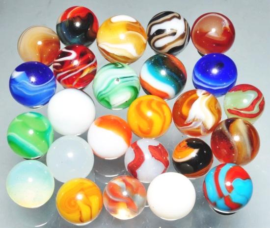 Lot of 25: Machine Made Marbles.: Includes a lemonade oxblood, silver oxblood, corkscrews and other machine mades. Size: Range: 9-16" Dia. to 11/16" Dia.