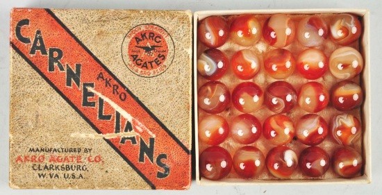 Box Set of No. 1 Akro Cornelian Marbles.: Box contains 25 marbles in excellent condition. Box top shows some wear around edges and corners. Size: Marbles: 11/16" Dia.