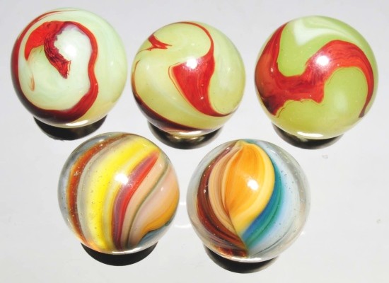 Lot of 5: Akro Agate Marbles.: Consists of two Akro Sparklers and three lemon oxbloods. Size: 5/8" Dia.