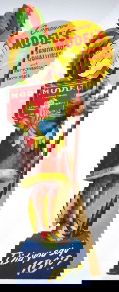 Model's Smoking Tobacco Counter Sign.: Colorful cardboard die-cut with easel back of Model's Indian holding package of tobacco. Size: 22" x 8 - 1/2".