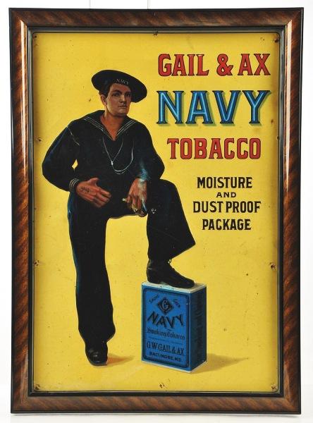 Gail & Ax Navy Tobacco Sign.: This classic is usually seen in paper, not tin. Gail & Ax sailor with foot on package of Navy Tobacco. Embossed lettering and figure. A few holes around perimeter. New frame. Size: Framed: 21 - 1/2" x