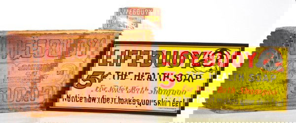 Lot of 3: Lifebuoy Soap.: Early lot includes wood shipping crate with old fisherman image wood-burned into box, very old soap box with same image on colorful paper box, and bright tin sign (Baltimore Sign Co.). Size: Largest: