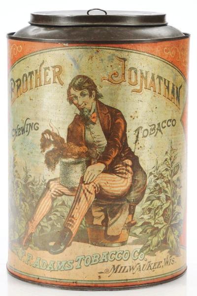 Brother Jonathan Tobacco Store Canister.: Extremely rare tin. Considered the most beautiful printed tin. Brother Jonathan was a patriot of George Washington's during the Revolutionary War. Overall fading but displays well. Tobacco manufacture