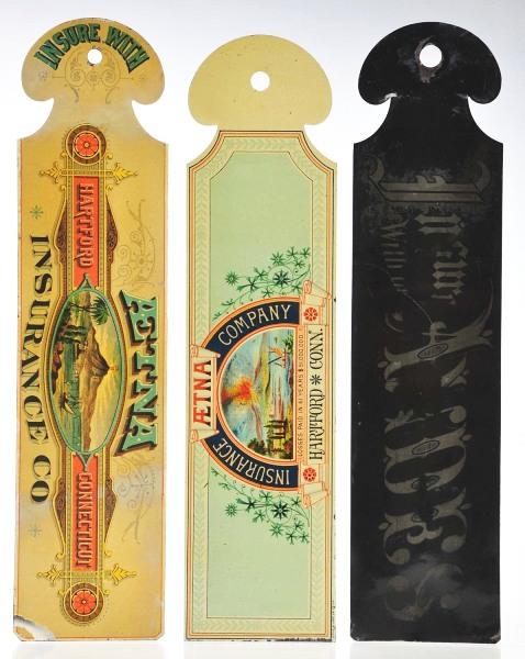 Lot of 3: Tin Ledger Markers.: Pre-1900 lot of tin litho ledger markers include two-sided brown/tan Andes Insurance and two very colorful and bright variations for Aetna Insurance picturing Mt. Aetna. Size: Largest: 12 - 1/4" L.