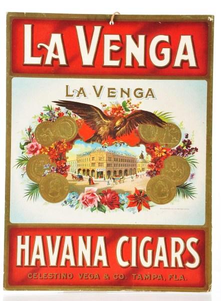 Lot of 2: Tobacco Signs.: LaVenga Cigar hanging sign with image of LaVenga factory and street scene surrounded by gold coins and floral border and die-cut cardboard easel back sign of a Mercantile Cigar tin. Size: Largest: 10