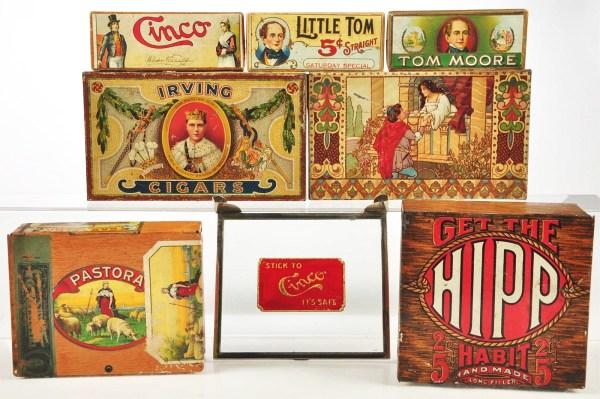 Lot of 8: Cigar Tins.: Lot includes tin square corner boxes picturing Romeo and Juliet, Irving Cigars, Pastora, and Hipp Cigars, and paper boxes for Cinco, Little Tom Straight and Tom Moore cigars, and glass lid top for cig