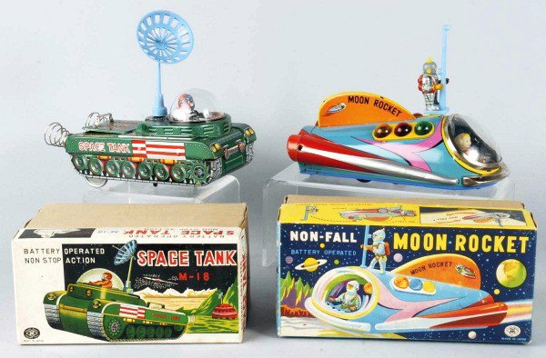 Lot of 2: Space Vehicle Battery-Operated Toys.: Japanese. Both made by MT. Working. Includes Non-Fall Moon Rocket and M-18 Space Tank. Includes both original boxes and original cardboard inserts for the Space Tank. Size: Largest: 9 - 1/2" L.
