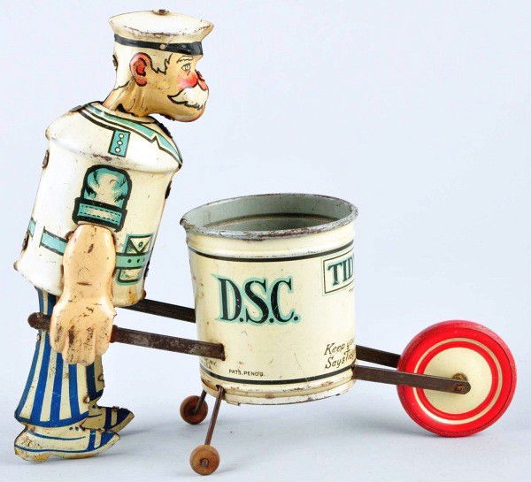 Tin Litho Marx Tidy Tim Wind-Up Toy.: American. Working. Missing tools. Moderate overall scratching and wear. Size: 7 - 1/2" T.