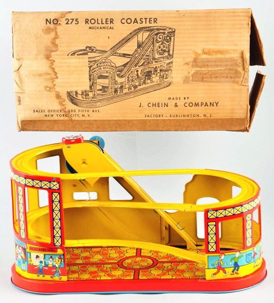 Tin Litho Chein Roller Coaster Wind-Up Toy.: American. Working but elastic band needs adjustment to work properly. One original red car. Nice tin litho around base. Includes original box marked "No. 275" with some tape. Size: 19" L.