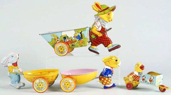 Lot of 4: Tin Litho Chein Easter Pull Toys.: American. Nice color lithography. Includes one large rabbit pulling cart, two small rabbits pulling carts, and one chick pushing cart. Very little wear overall. Size: Largest: 11" L.