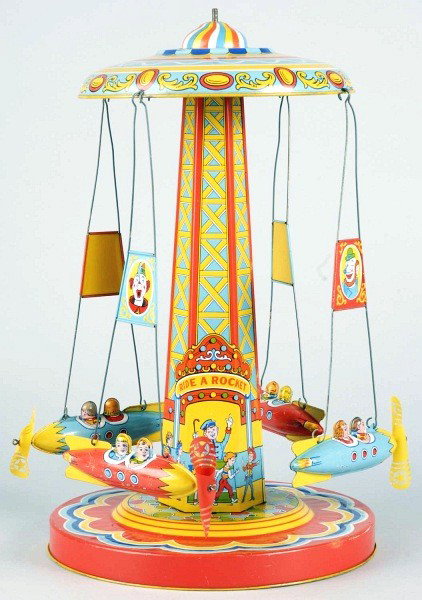 Tin Litho Chein Ride-A-Rocket Wind-Up Toy.: American. Working. Beautiful lithography and original celluloid propellers. When in operation, rockets spin around base. Some minor scratching and wear. Size: 18" T.