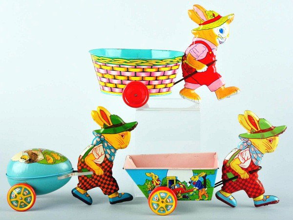 Lot of 3: Tin Litho Chein Rabbit Cart Toys.: American. Includes three different variations of the same toy. Very nice, bright, and colorful lithography. Some scratching and wear. Size: Largest: 11" L.
