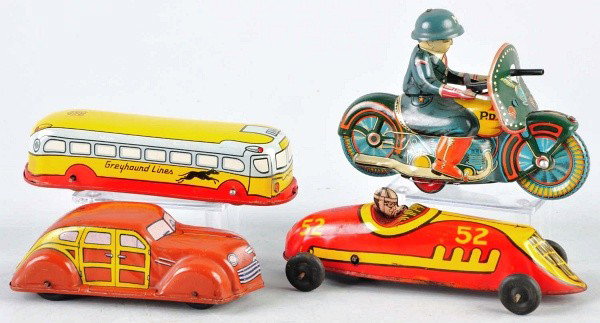 Lot of 4: Tin Litho Vehicle Toys.: Includes Japanese friction Petey Motorcycle, Chein wind-up Woody Wagon, Chein wind-up Greyhound Lines bus, and no. 52 wind-up race car. Some scratching and wear overall, especially to roof of Woody Wa