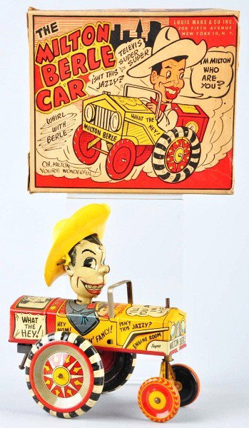 Tin Litho Marx Milton Berle Whoopee Car Toy.: American. Wind-up mechanism is working. Original plastic hat. Includes original box with missing flaps on one end. Size: 6" L.