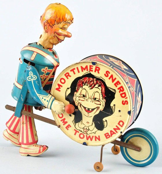 Tin Marx Mortimer Snerd Hometown Band Wind-Up Toy: American. Working. When in operation, Mortimer's right hand beats the side of the drum with mallet. Some scratching and wear, especially to drum sides. Size: 8 - 1/4" T.