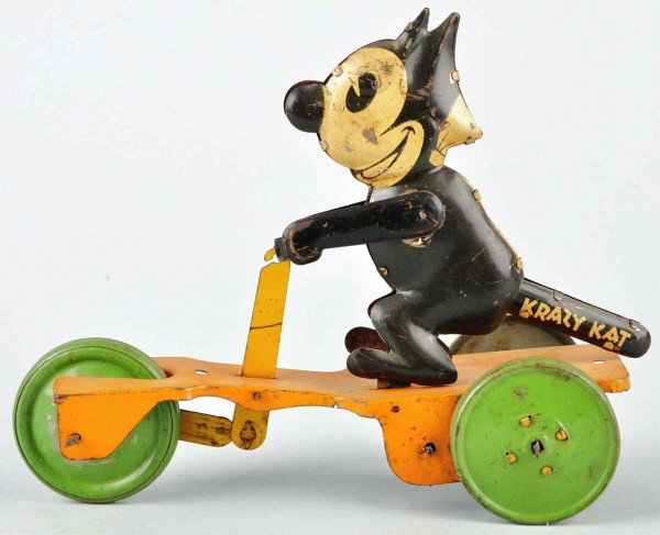 Tin Litho Chein Krazy Kat Scooter Wind-Up Toy.: American. Working. Marked "1932 International Feature Service" on right foot and "Krazy Kat" on tail. Moderate scratching throughout. Size: 7 - 1/2" L.