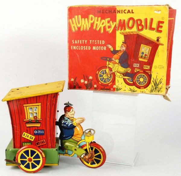 Tin Litho Wyandotte Humphrey Mobile Vehicle Toy.: American. Working. Toy is missing plastic stack on top of roof and has some scratching throughout. Includes original box with nice color lithography. Box marked "Ham Fisher", has one inside flap that 
