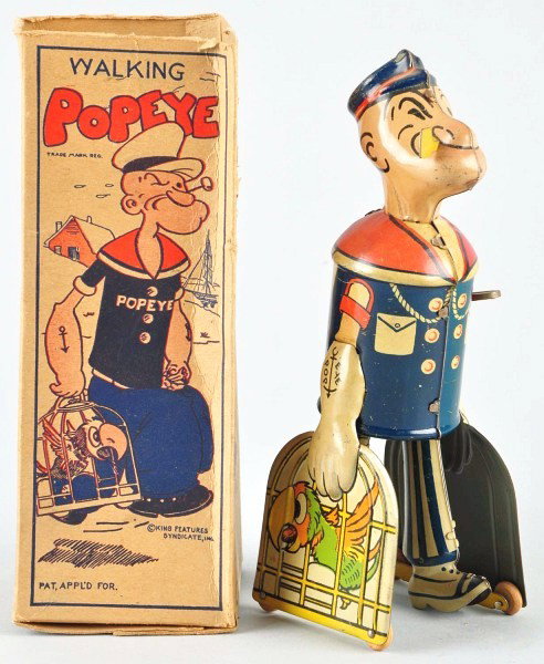 Tin Litho Marx Walking Popeye Wind-Up Toy.: American. Working. Original pipe and very little scratching and wear. Includes original box with beautiful color graphics of Popeye walking with parrot cage. Box with detached but present top flaps an