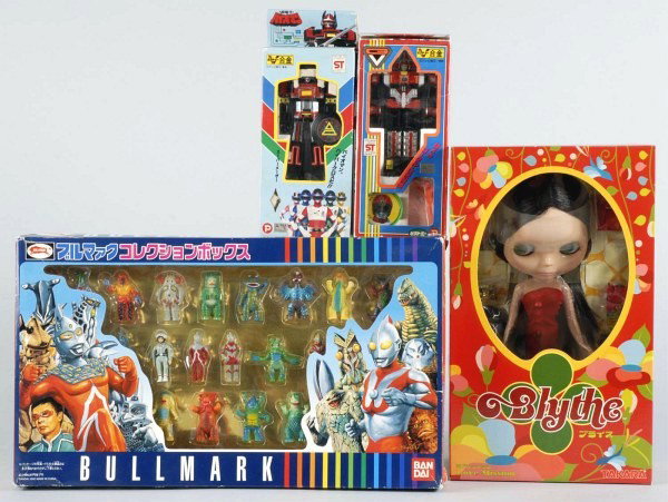 Lot of 4: Contemporary Superhero Toys.: Japanese. Includes one Blythe Love Mission figure in original box, one set of Bullmark Bandai superhero and villain figures circa 2002, and two Bio Robo figures in original boxes. Size: Largest Box: 8