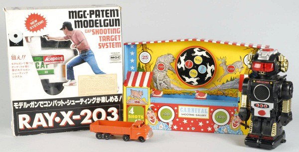 Lot of 6: Miscellaneous Toy Items.: Includes one contemporary robot, one contemporary Japanese ray gun in original box, one Edison Monte Carlo toy shotgun with shells in original box, one Ohio Art carnival shooting gallery in original b