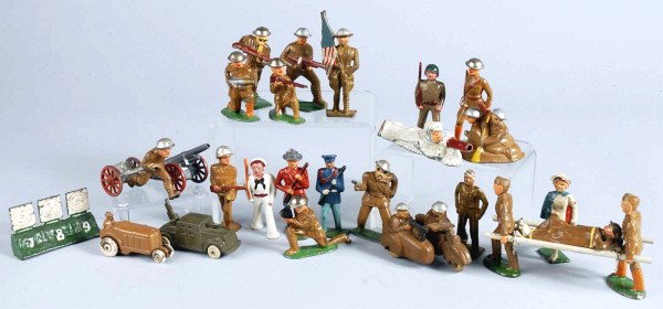 Lot of 27: Dimestore Toy Soldiers.: Includes Barclay stretcher team, two men on a raft, camera man, Manoil lying Finn, 7-8-9 target, Grey Iron mountie, Auburn Rubber motorcycle and sidecar with end of gun tip missing. One figure is repa