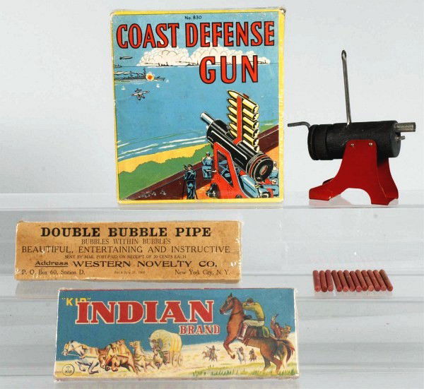 Lot of 3: Boxed Cap & Pipe Toy Guns.: Boxes are all shrink wrapped. Size: Largest Box: 8 - 1/4" x 7 - 1/4".